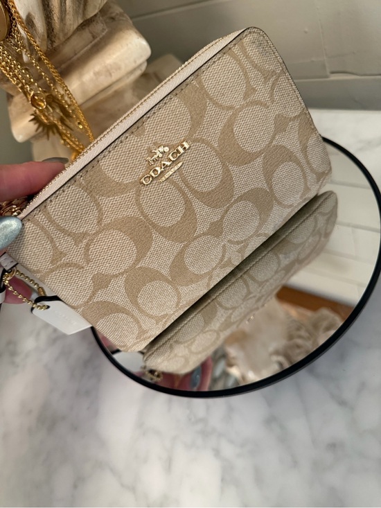 Coach Handbags - Coach EUC Beige Signature Zip double pocket Wallet Wristlet